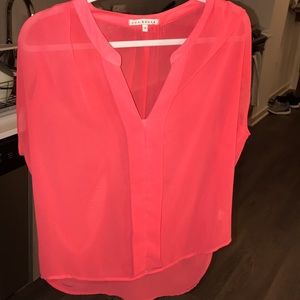 Bright pink sheer blouse